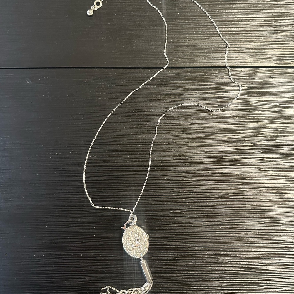 Henri Bendel Elegant Silver Pendant Necklace